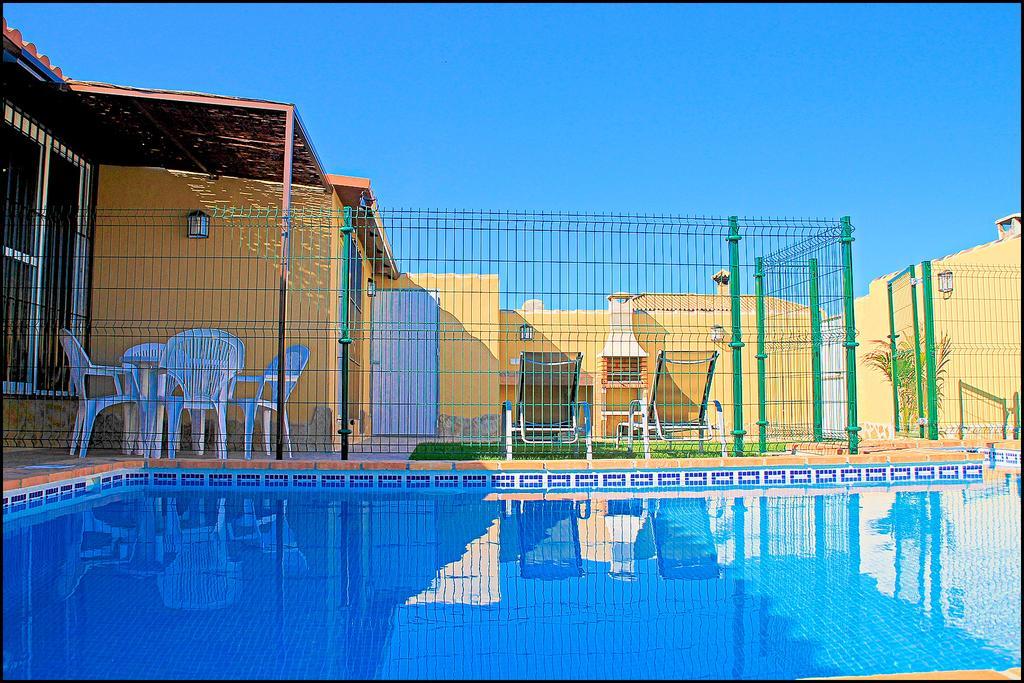 Bungalow Curro Pareja con piscina privada Conil De La Frontera Habitación foto